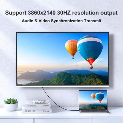 HDMI to DisplayPort Adapter Cable with Power Supply, 1.8 Meters connecting laptop to 4K TV showing 3860x2140 30Hz