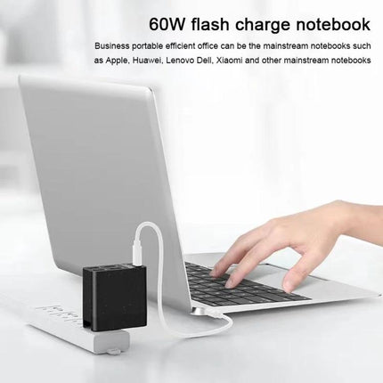 Multi-Port USB-C Hub for Everyday Device Connections connected to laptop powering external drive and keyboard for portable workspace