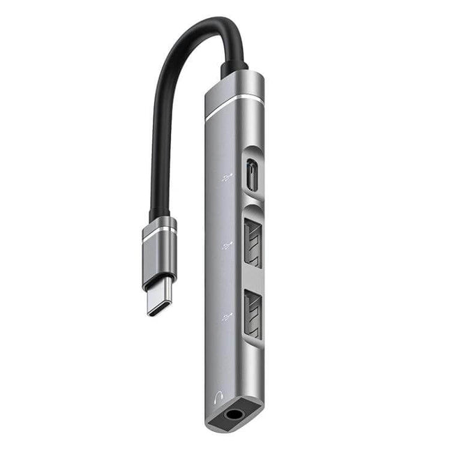 USB-C Docking Station with 3.5mm Jack and Multiple USB Ports in aluminum alloy showing USB-C plug, USB-A ports and 3.5mm audio jack