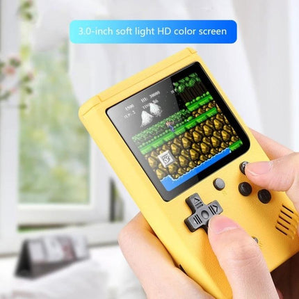 Macaron Mini Handheld Game Console with 800 Built-in Games yellow 3-inch LCD playing retro platformer handheld