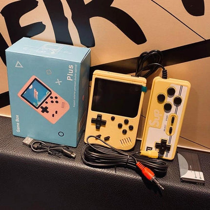 Macaron Mini Handheld Game Console with 800 Built-in Games yellow portable retro-style unit with wired controller, AV cable and blue box