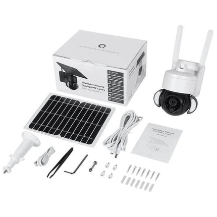 Solar-Powered Outdoor Floodlight Security Camera with Motion Detection kit laid out showing camera, solar panel, mounting hardware and cables