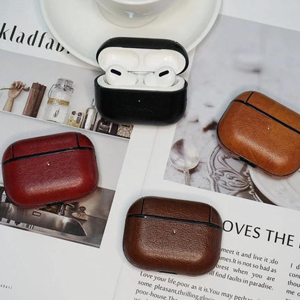 Leather Case with Lanyard for Everyday Earphone Protection - four leather earphone cases in black red brown tan on magazine background