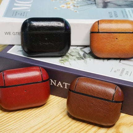 Leather Case with Lanyard for Everyday Earphone Protection - assorted brown, black, red leather protective cases shown on books