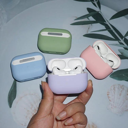 Silicone Case Protects AirPods During Daily Outings — pastel protective silicone AirPods cases in hand, lightweight dust and scratch protection