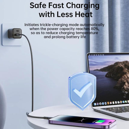 Joyroom Cable for Everyday Phone Charging at Home and Travel showing fast safe charging from wall outlet to phone on desk next to laptop
