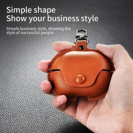 Protective Leather Case for Everyday Earbud Travel Needs shown as compact brown PU leather keychain case in hand