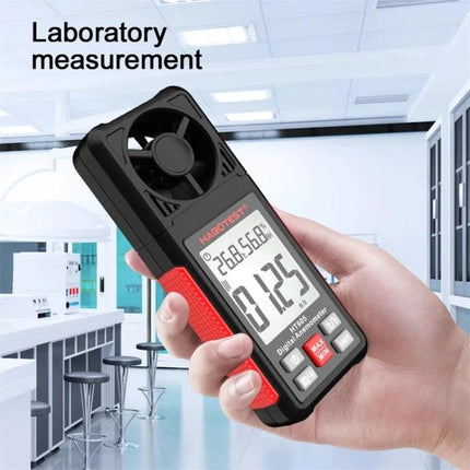 HABOTEST Portable Handheld Wind Speed Meter for Outdoor Use held in hand showing digital display and fan in laboratory setting