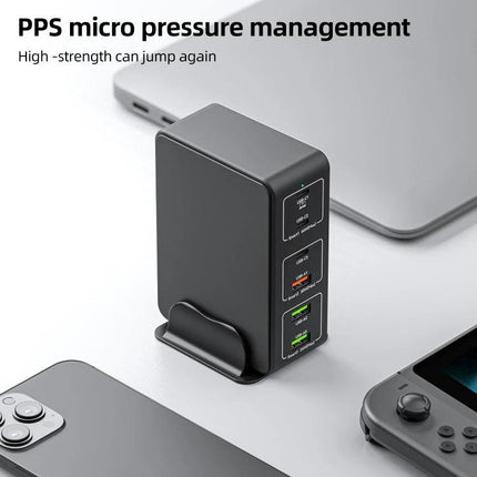 Multi-Port Desk Charger for Everyday Home Device Needs - six-port vertical desk charger powering smartphone, laptop and gaming console in home office setup