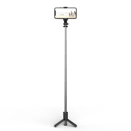 A Compact Selfie Stick for Everyday Outings and Travel — compact Bluetooth selfie stick tripod holding phone for group photos and vlogging
