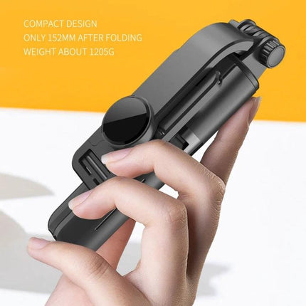 A Compact Selfie Stick for Everyday Outings and Travel - compact folding Bluetooth selfie stick held in hand