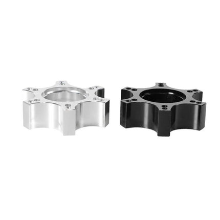 Thrustmaster Adapter Enhances Home Racing Simulator Experiences - silver and black wheel adapter pair for T300RS setup