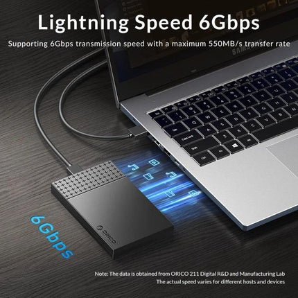ORICO 2.5-Inch Hard Drive Enclosure for Everyday Storage connected to laptop showing 6Gbps high-speed data transfer