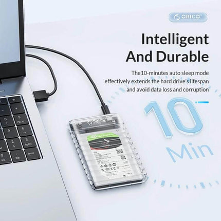ORICO USB 3.0 External Case for 2.5 Inch Hard Drives connected to laptop, transparent ABS shell showing 2.5" drive and USB 3.0 cable
