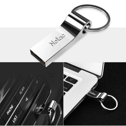 Netac U275 64GB USB Flash Drive for Secure Data Storage silver metal keyring USB flash drive shown connected to laptop and car audio port