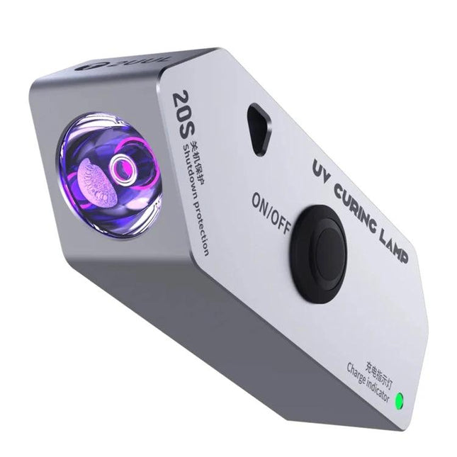 Compact Portable UV Curing Lamp for Electronics Repairs - handheld silver UV curing lamp with on/off button and purple light for fast adhesive curing