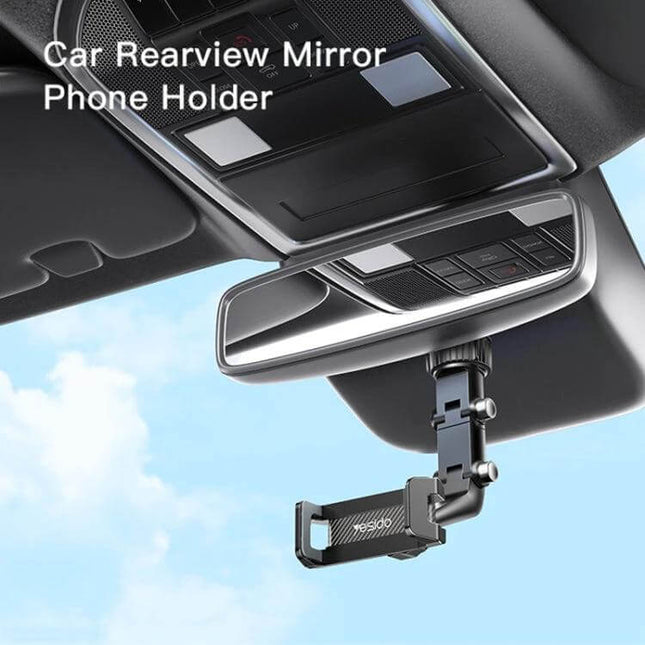 Yesido Car Rearview Mirror Phone Holder With Adjustable Angle mounted under mirror showing adjustable arm and phone clamp with 960-degree rotation