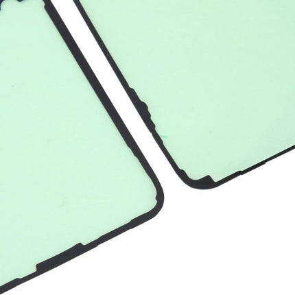 Adhesive for Samsung Phone Back Cover Repairs at Home - closeup of mint adhesive gaskets for Samsung back cover repair
