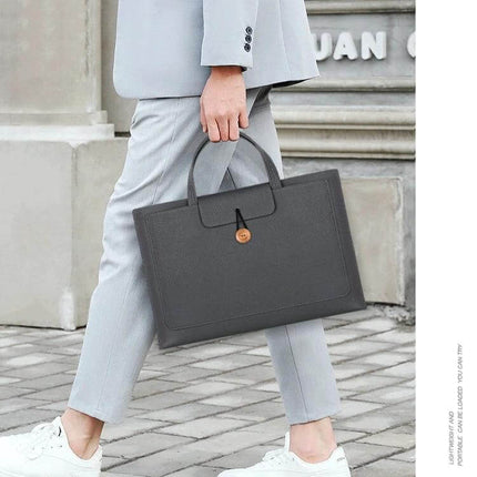 Portable Elastic Laptop Inner Bag for 13-14 Inch Laptops carried in a slim protective sleeve inside a briefcase-style carry bag