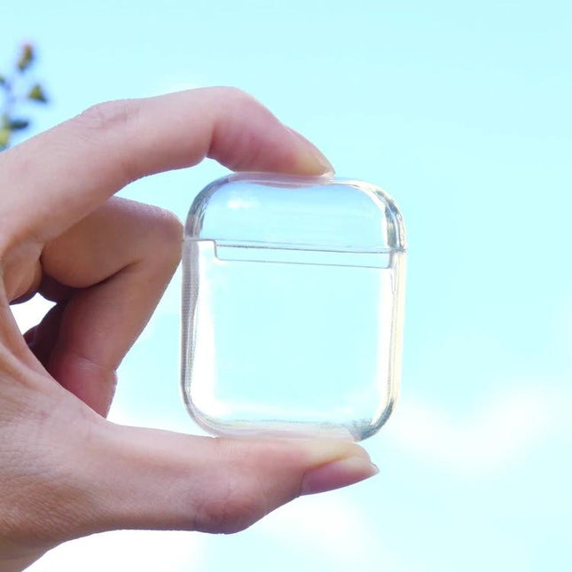 Clear TPU Protective Case for AirPods in Daily Commutes and Activities shown held between fingers protecting earbuds