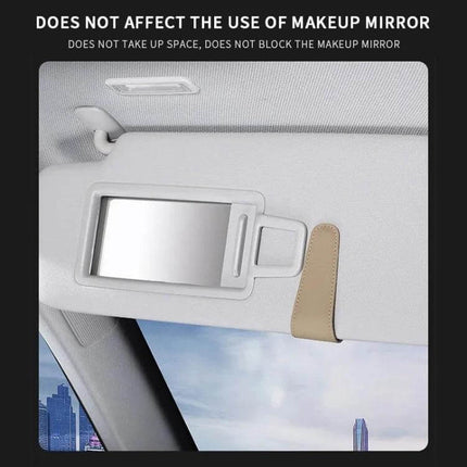 Car Sun Visor Glasses Holder With Magnetic Back Clip attached to sun visor beside makeup mirror, microfiber leather compact storage