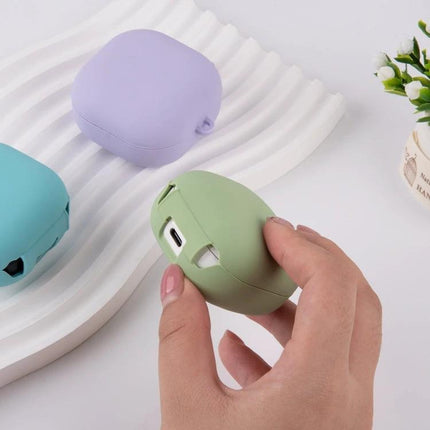 PC Lining Silicone Case for Samsung Earbuds in Daily Routines - green protective silicone case held in hand with pastel purple and blue cases nearby
