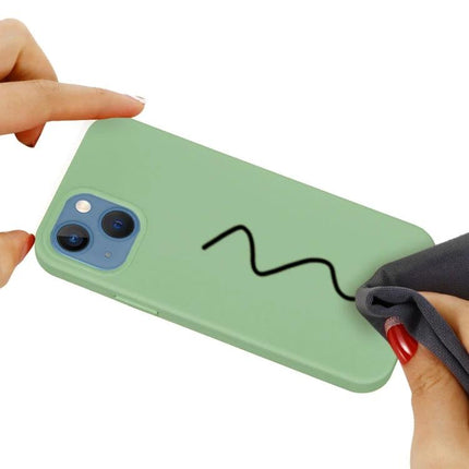 iPhone Silicone Case Slim for Everyday Use in mint green being wiped clean, slim silicone shell with PC frame protection