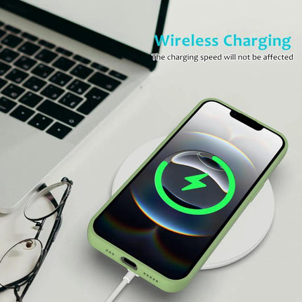 Essential Silicone Case for Everyday iPhone Protection shown in green on wireless charger beside laptop and glasses