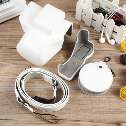 Full Body Leather Protective Camera Case with Strap, Deluxe Edition in white leather with strap and accessories for Canon EOS R50