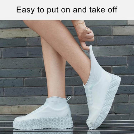 Waterproof Silicone Non-Slip Shoe Covers for Everyday Protection, Sizes S and M - white silicone covers being pulled on, easy to put on and take off
