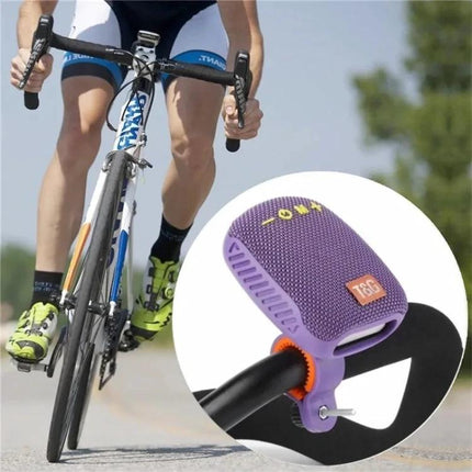 Bluetooth Portable Speaker For Cycling And Daily Outdoor Use compact purple speaker mounted on bike handlebar for rides