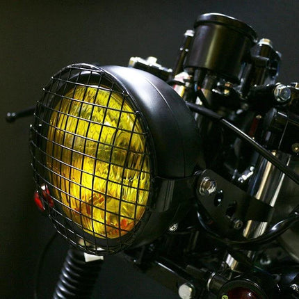Yellow Retro LED Motorcycle Headlight For Easy Night Riding - aluminum housing, yellow lens with protective grille mounted on motorcycle
