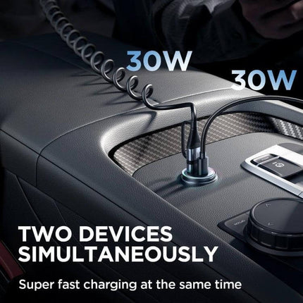 Joyroom Mini Metal Car Charger With Dual USB Ports shown in car console charging two devices 30W per port, compact thumb-sized metal design