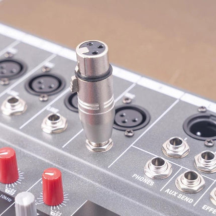 LZ1179 Connector for Home Audio Setups and Travel Gear — XLR female to TRS male adapter plugged into audio mixer for clear portable recording