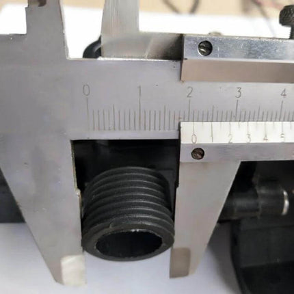 Portable Self-Priming Diaphragm Pump for Vehicle Washing showing threaded outlet measured with calipers for installation fit