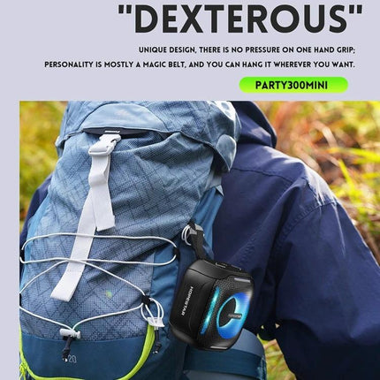 HOPESTAR Portable Bluetooth Speaker For Outdoor Picnics And Home hung from a backpack during a hike showing compact portable use