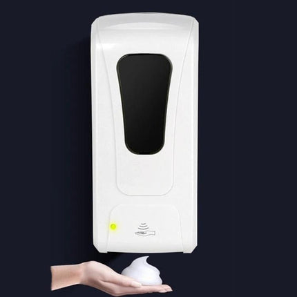 Automatic Soap Dispenser for Daily Home Hand Hygiene - touchless wall-mounted white dispenser releasing foam over hand