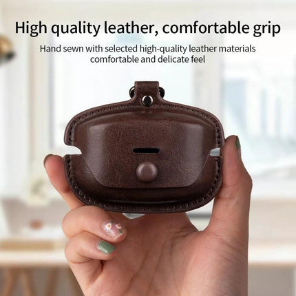 Stylish Leather Case for Protecting Earphones During Daily Commutes brown PU leather protective earphone case held in hand