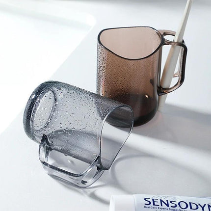 Daily Essentials Cup for Mouthwash and Toothbrush Storage - curved rim bathroom cup with built-in slot, toothbrush and mouthwash organizer