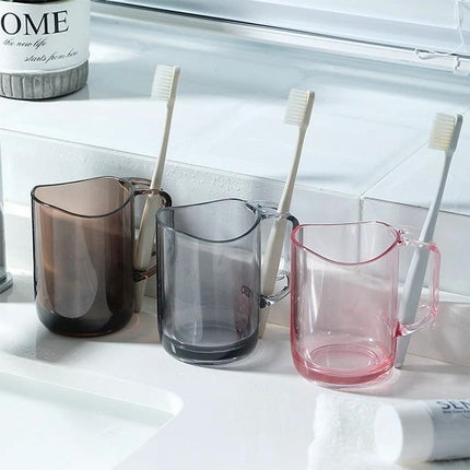 Daily Essentials Cup for Mouthwash and Toothbrush Storage on sink holding mouthwash cup and toothbrushes with curved draining rim