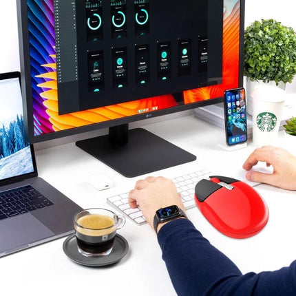 HXSJ Rechargeable Wireless Mouse for Everyday Computing shown in a tidy desk setup with monitor, laptop, smartphone, and coffee cup