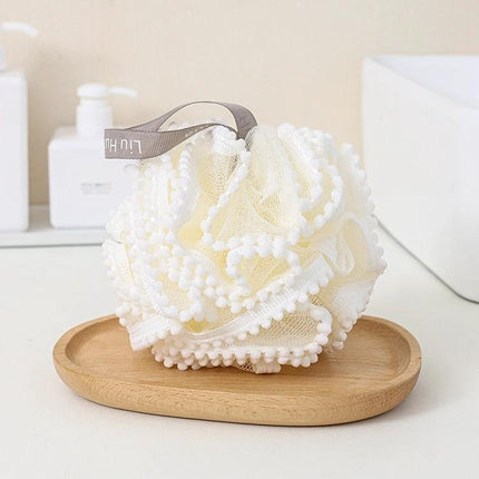 Pearl Shower Flower Ball for Daily Bathing Essentials white exfoliating bath pouf on wooden soap dish