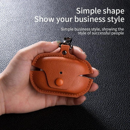 Stylish Leather Case Protects Earphones During Daily Outings brown PU leather earbud pouch in hand, fingerprint and scratch resistant