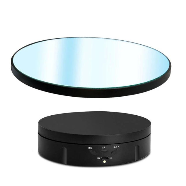 22cm Electric Rotating Display Stand with Remote Control showing black base and mirrored rotating platform for jewelry and product photography