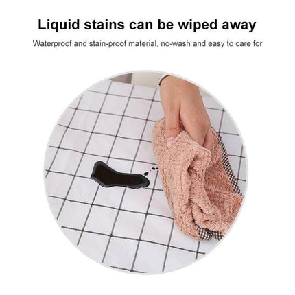 Home Tablecloth No-Wash PVC Coffee Table Cloth 137x90cm - wipe-clean vinyl PVC with grid pattern showing liquid wiped away