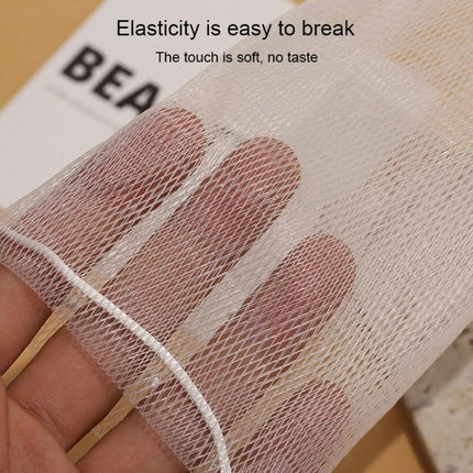 Soft Foaming Net for Daily Skin Cleansing at Home - close-up of soft PE mesh creating rich lather, held to show texture and fine netting