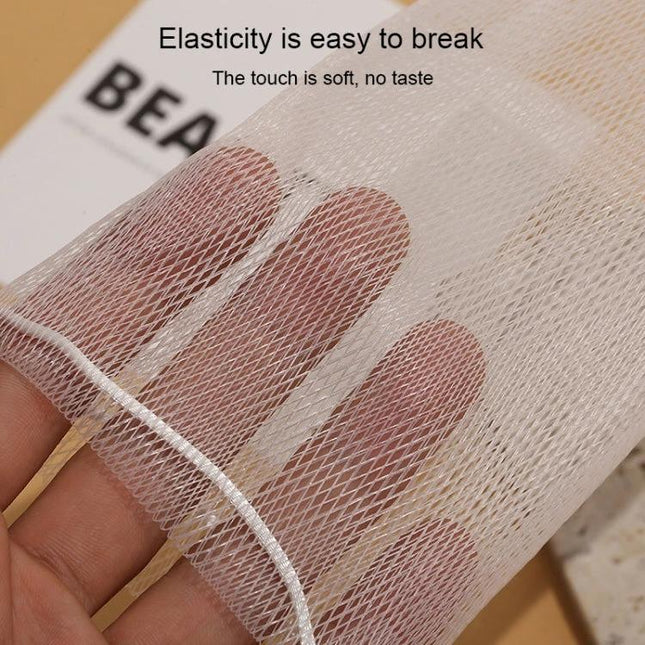 Soft Foaming Net for Daily Skin Cleansing at Home - close-up of soft PE mesh creating rich lather, held to show texture and fine netting