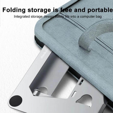 Lenovo Thinkplus Adjustable Desktop Laptop Holder folded and sliding into a slim laptop bag for portable storage