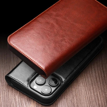 QIALINO Genuine Leather Phone Case With Built In Stand For Daily Protection On The Go brown folio cover showing camera cutout and textured leather finish