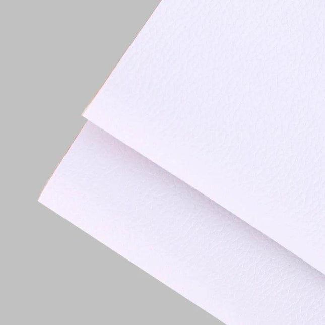 Self-Adhesive Leather Repair Patch 30 x 137 cm For Sofa And Car Seat white PVC leather sheet close-up, textured self-adhesive repair material